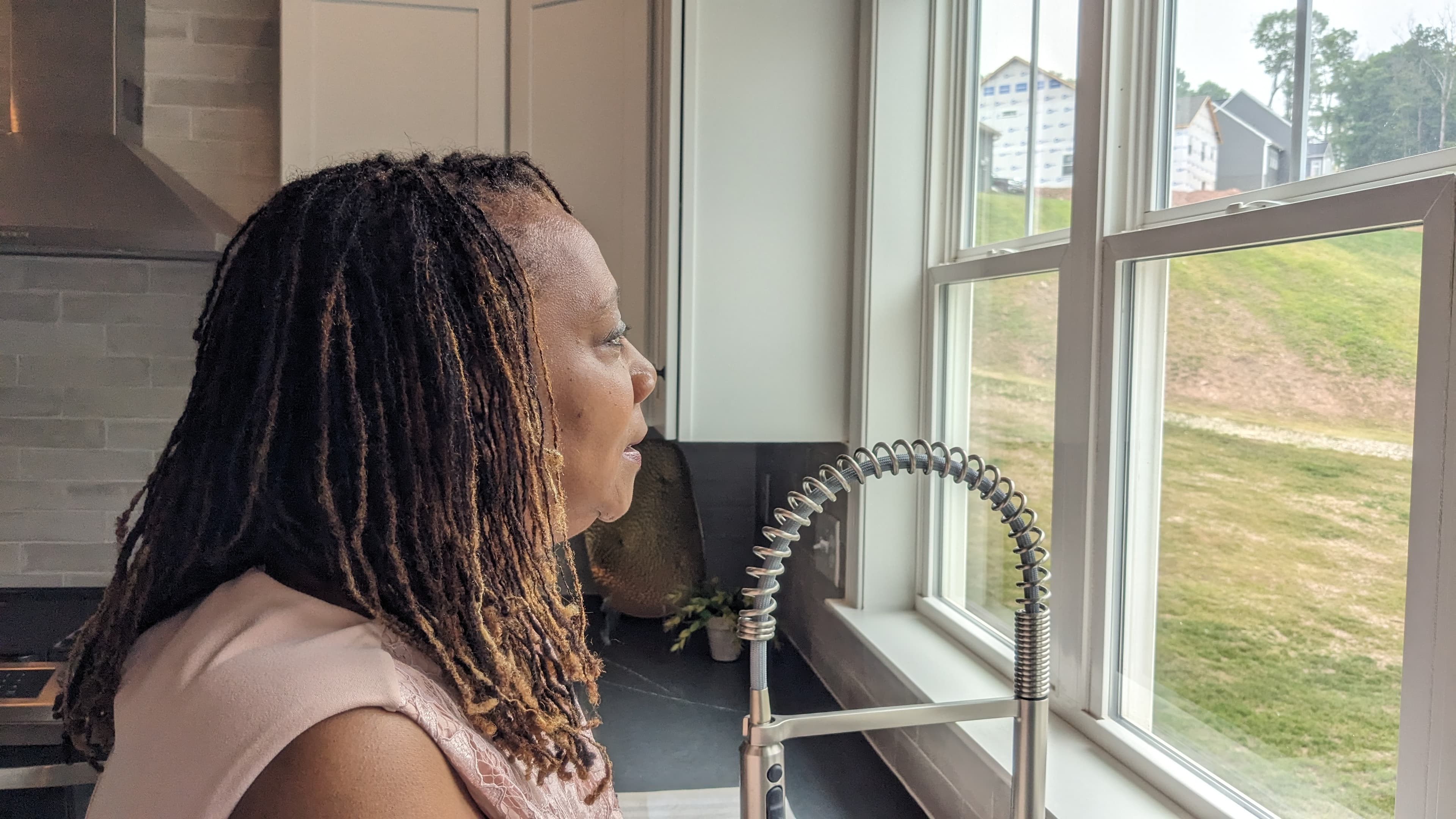 Shernette overlooks to window